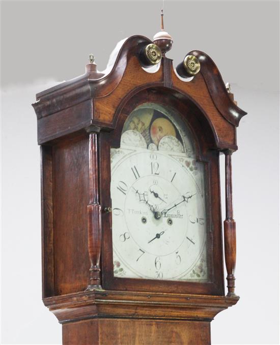 T. Tomkins, Leominster. A George III oak eight day longcase clock, 7ft 6in.